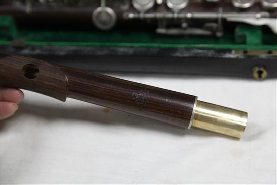 A Rudall Carte & Co. rosewood flute, no. 7340, flute 26.5in.